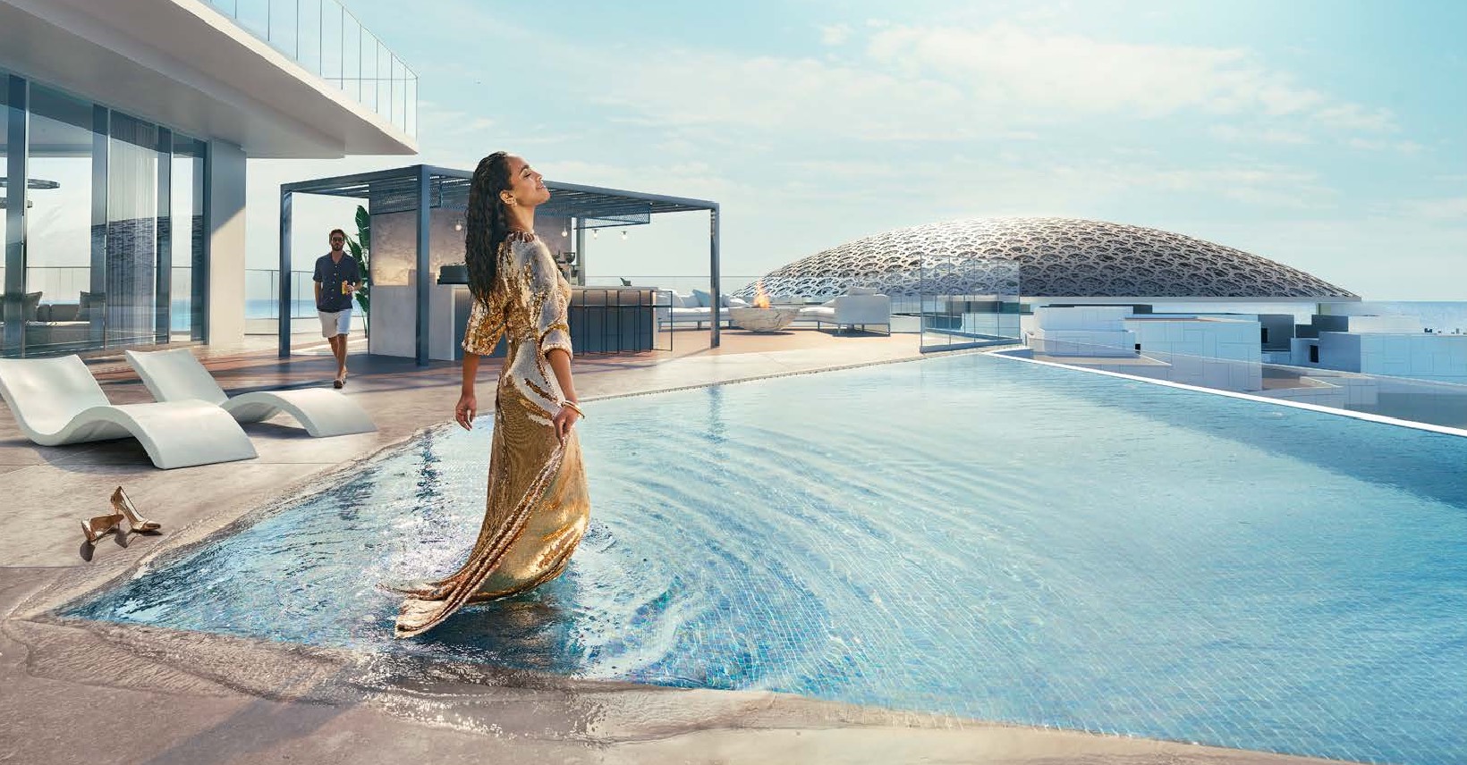 Residents walking beside landscaped gardens and podium pool within Saadiyat Grove