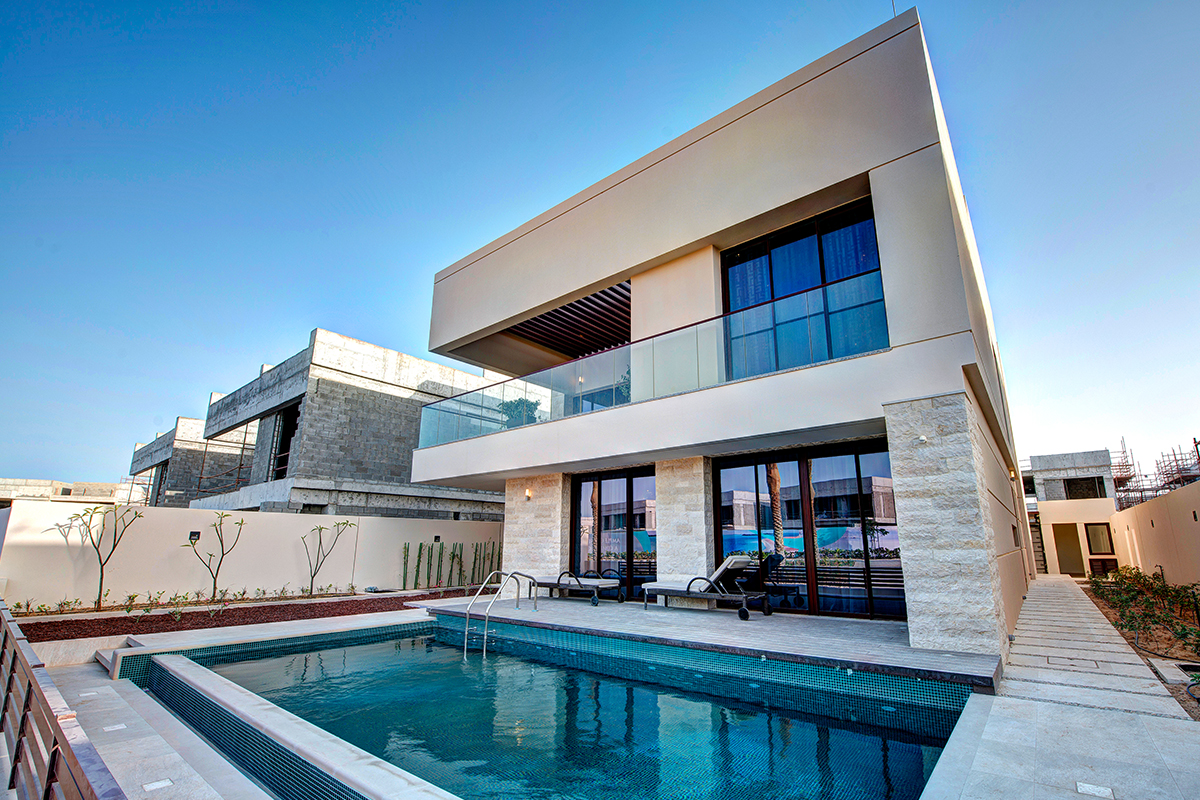 Elegant architecture of Hidd Al Saadiyat villa with landscaped gardens