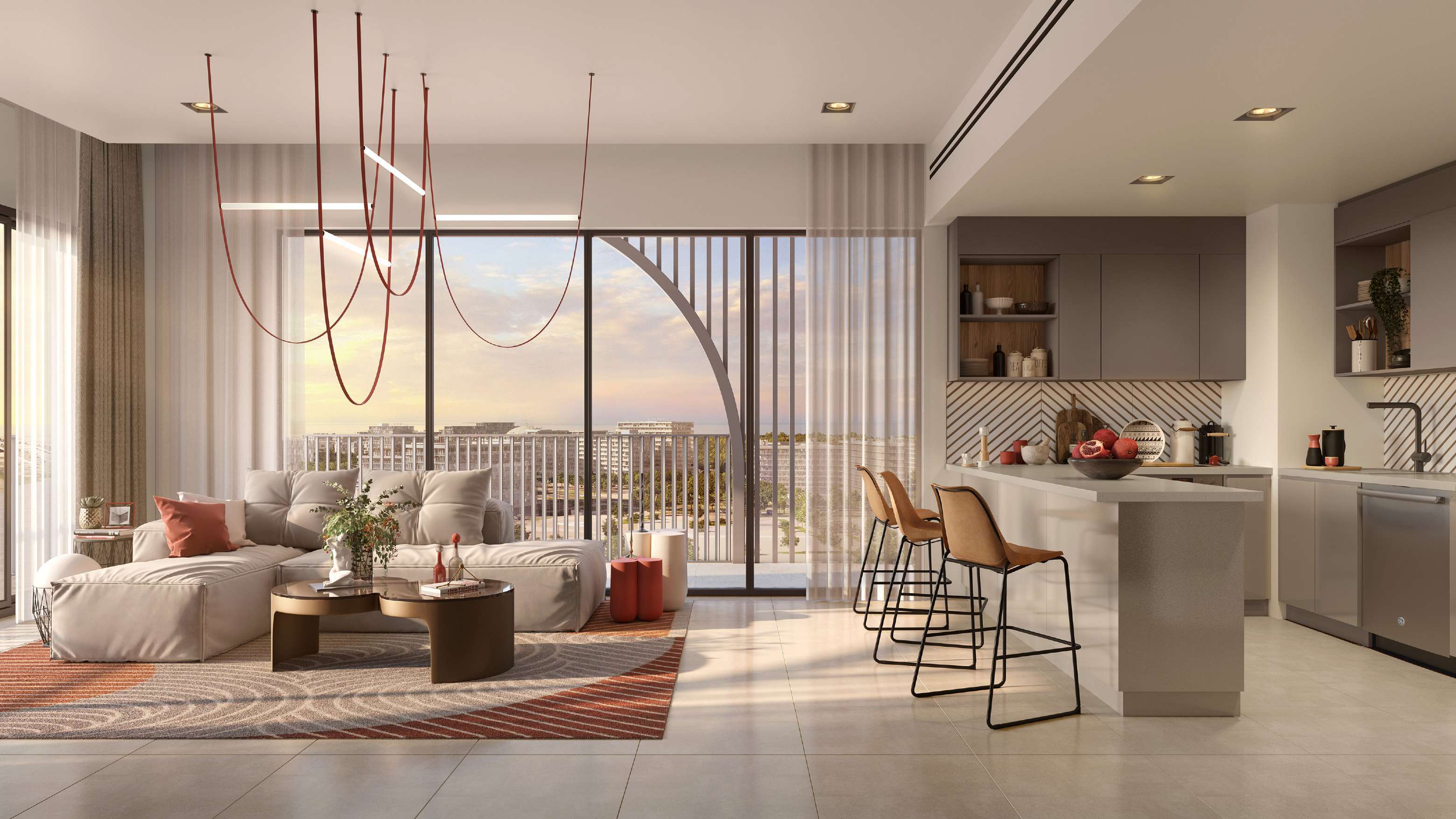 Contemporary kitchen and dining area at Manarat Living III on Saadiyat Island, Abu Dhabi with stylish finishes.