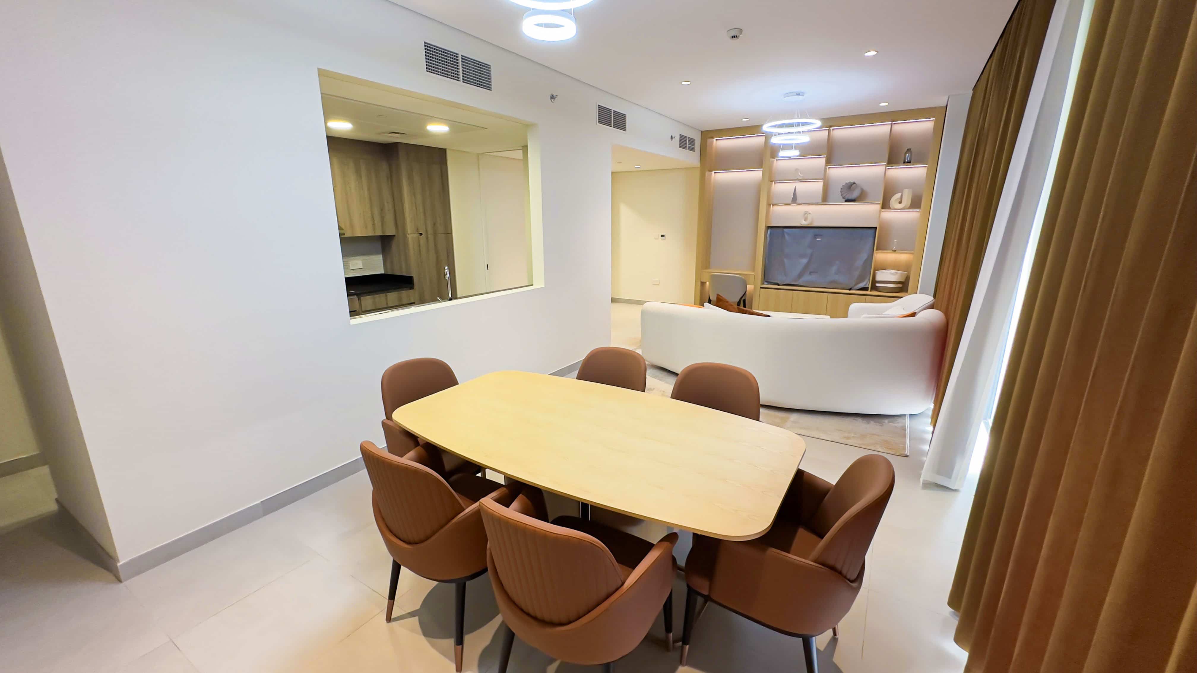 Contemporary living and dining space at C‑3 Gardens Saadiyat Island Abu Dhabi with open layouts and stylish interiors