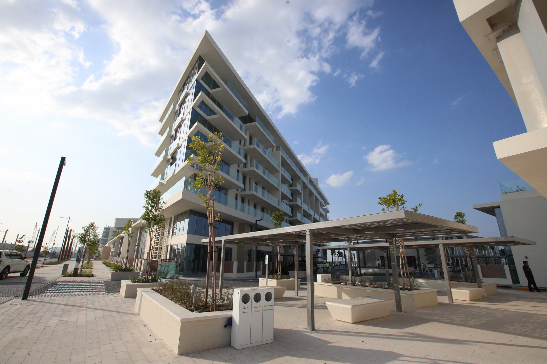 Aerial panorama of Mamsha AlSaadiyat stretching along Saadiyat Island’s white sand coastline