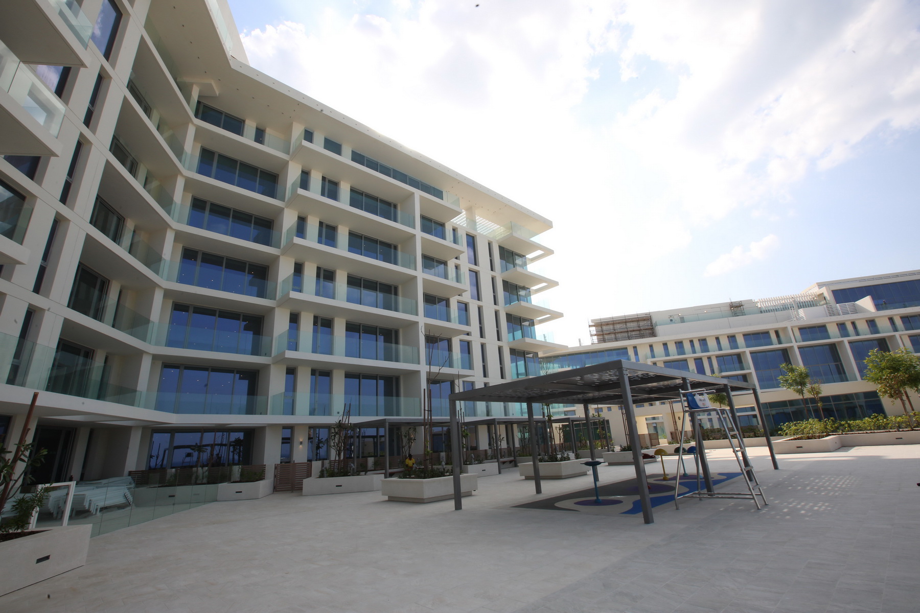 Full-frontal view of Mamsha’s residential towers facing the Arabian Gulf and open skies