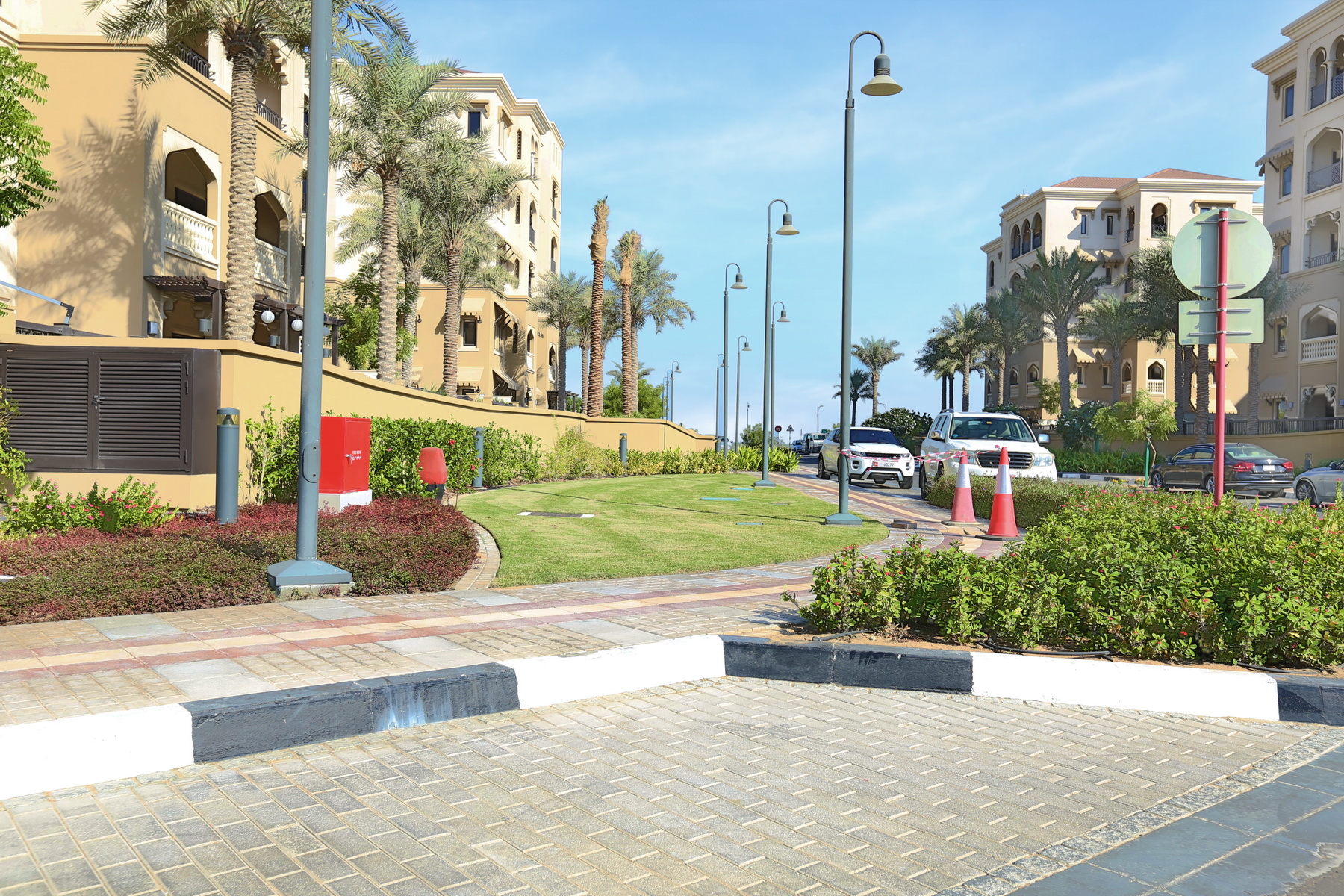 Luxury Mediterranean‑style exterior of Saadiyat Beach Residences overlooking landscaped courtyards