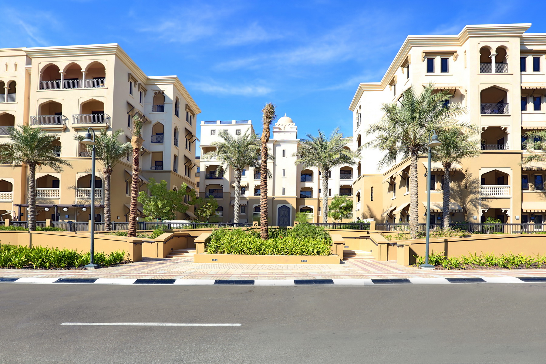 Saadiyat Beach Residences community exterior with landscaped walkways and green open spaces.